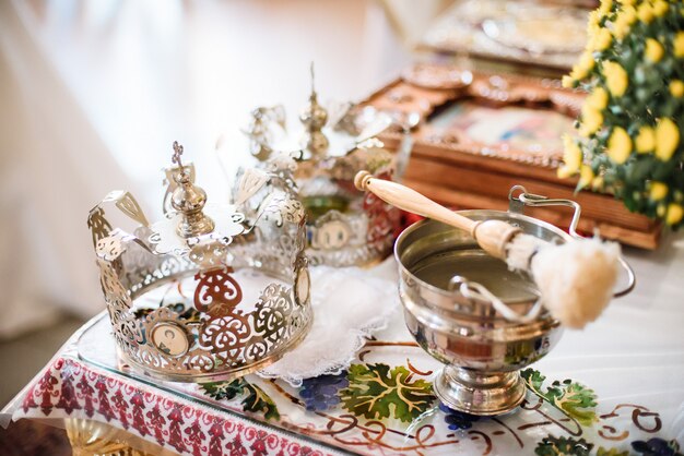 Wedding ceremonial attributes are on the altar in a church