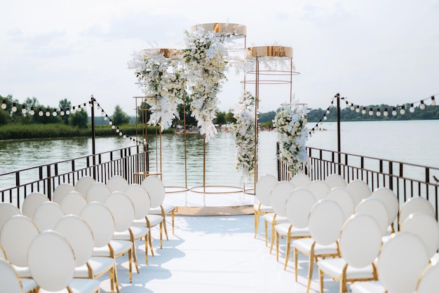 Wedding ceremony area, arch chairs decor