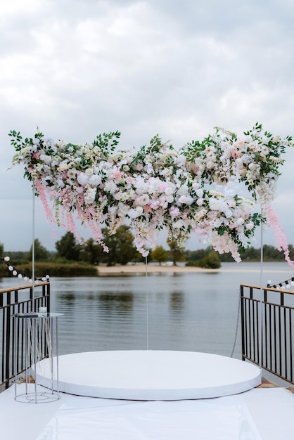 Wedding ceremony area arch chairs decor