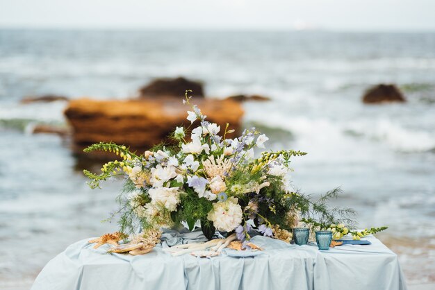 Wedding ceremony area on the sandy beach near the ocean