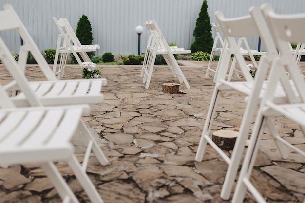 Wedding ceremony decoration, chairs, arches, flowers and various decor