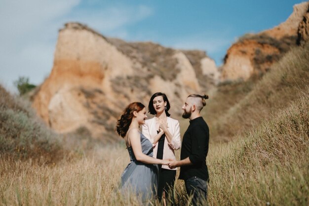 Wedding ceremony of a girl and a guy on high hills