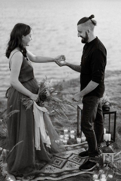 Wedding ceremony of a girl and a guy on high hills