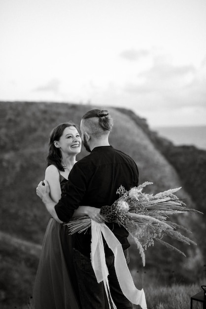 Wedding ceremony of a girl and a guy on high hills