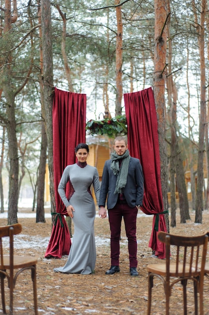 Wedding ceremony for two near the red arch