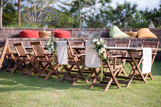 Wedding Ceremony with flowers outside in the garden