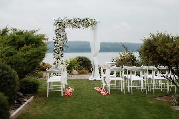 Wedding ceremony in the woods among the trees on the green track