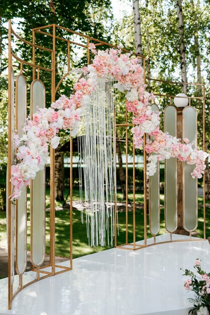 Wedding ceremony in the woods among the trees on the green track