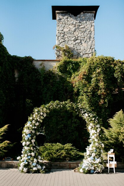 Wedding ceremony in the woods among the trees on the green track