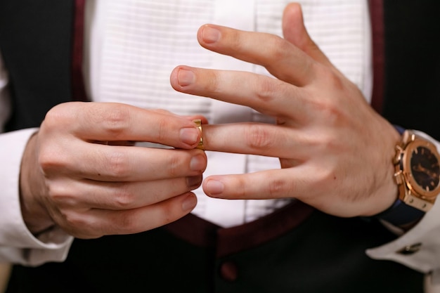 Wedding closeup of the groom's hand