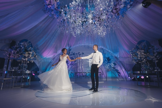 wedding couple bride and groom in tent with luxury decor