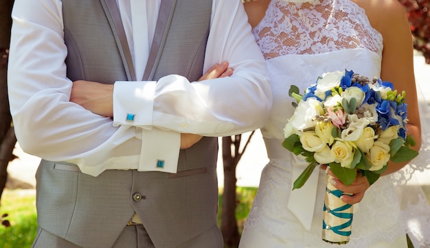 Wedding couple holding hands. bride and groom