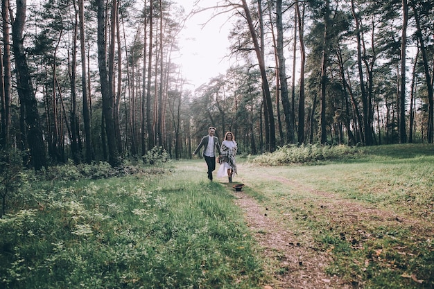 Wedding couple in pine forest