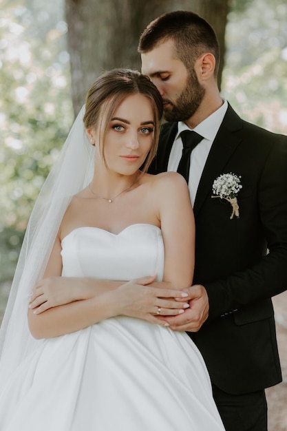 Wedding couple in pine forest