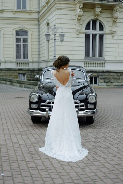 Wedding couple with wedding car