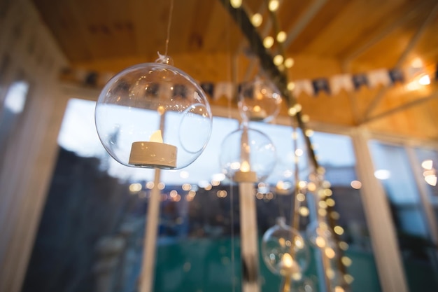 Wedding decor candles in glass flasks