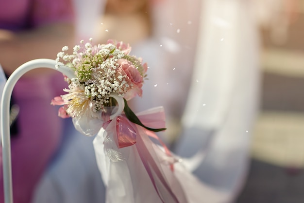 Photo wedding decoration with pink ribbon