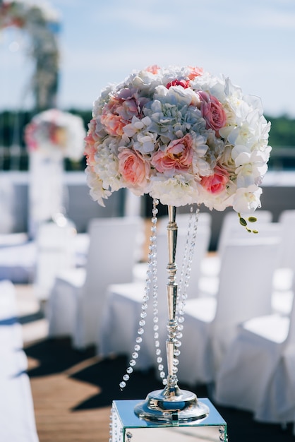 Wedding decorations from flowers and a wedding arch for the ceremony