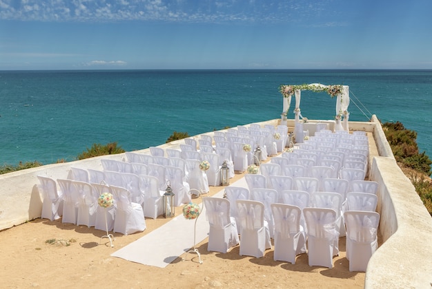 Wedding decorations on a rock Nossa Senhora Armacao de Pera.