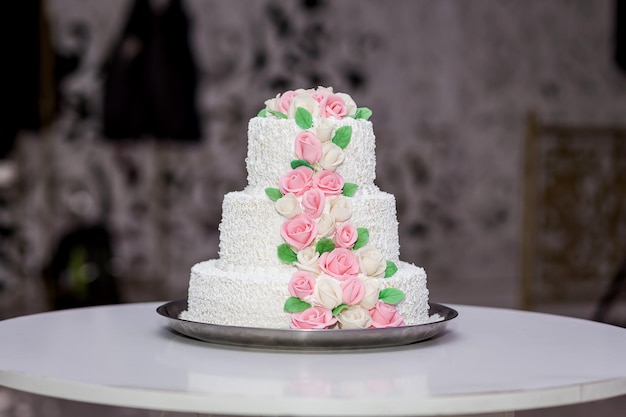 Wedding festive multistorey cake in white tone