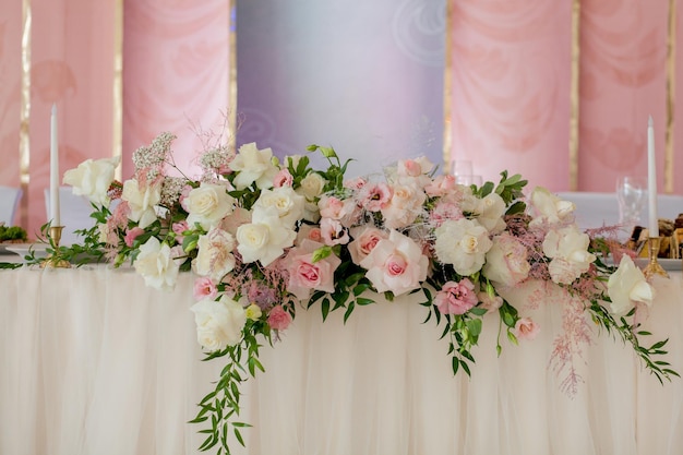 Wedding flower composition for guests tables decorative flowers on the wedding table