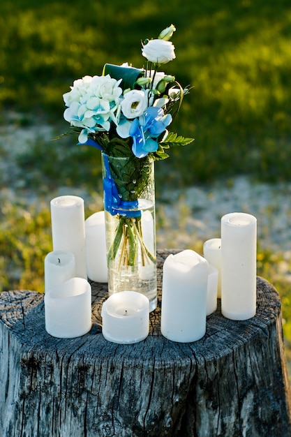 Wedding flowers in summer. Exit wedding ceremony by the water.