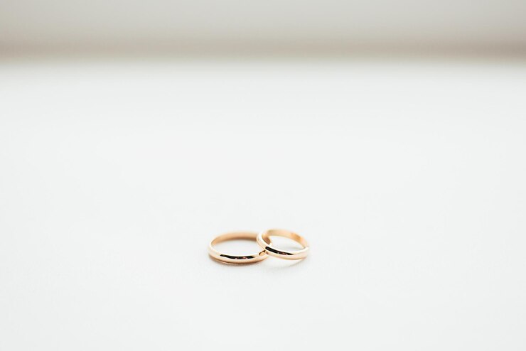 Wedding gold rings on a beautiful background wedding ceremony gathering bride and groom Mr and Mrs young family happy day love and forever together love storryxA