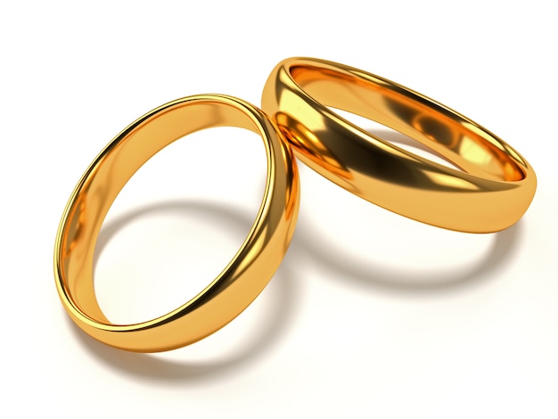 Photo wedding gold rings lie in each other