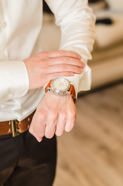 Wedding groom suit, white shirt, brown pants, watch