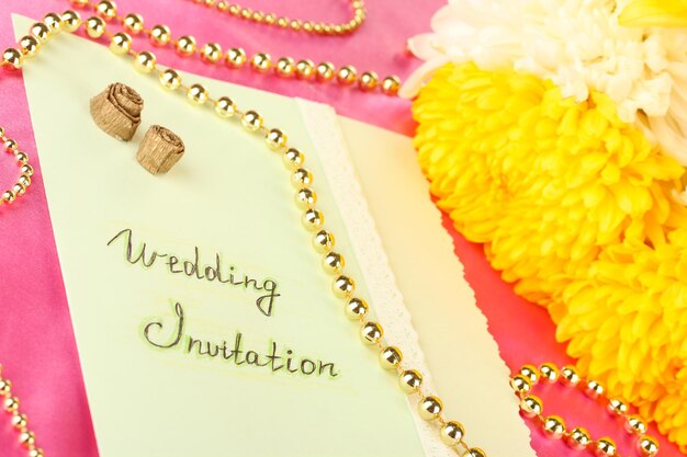 Wedding invitations on decorated table closeup