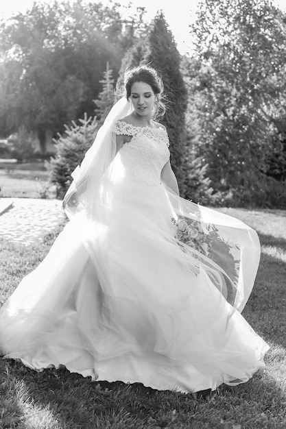 Wedding photography Bride black and white photo Woman with bouquet of flowers in her hands