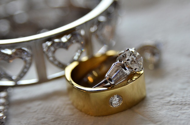 Wedding ring, groom and bride