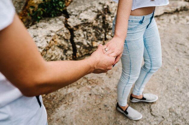 Wedding ring with a girl on her finger