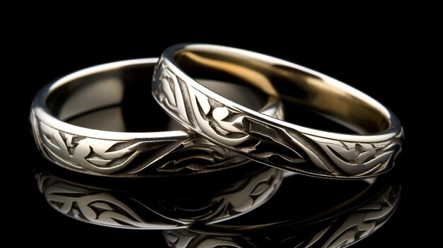 Photo wedding rings on the background of a wooden surface