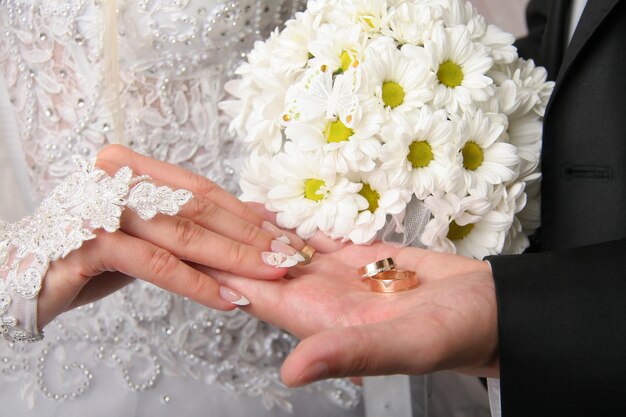 Wedding rings and bouquet