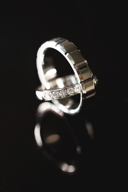 Wedding rings on dark background