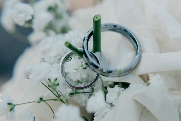 Wedding rings on a flower