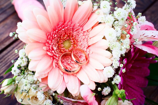 Wedding rings and flowers.