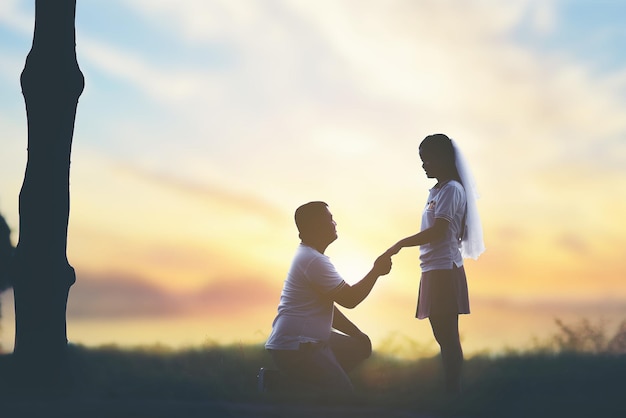 Wedding rings in the hands of the bride and groom. Wearing wedding rings, gentle touches, hands of the bride.