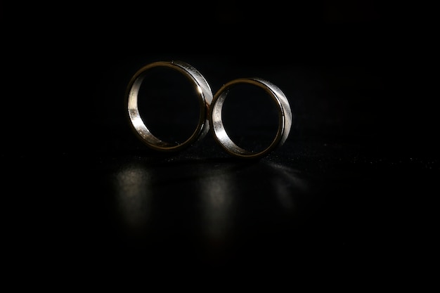 wedding rings isolated with black background