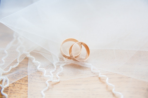 wedding rings on lace veil