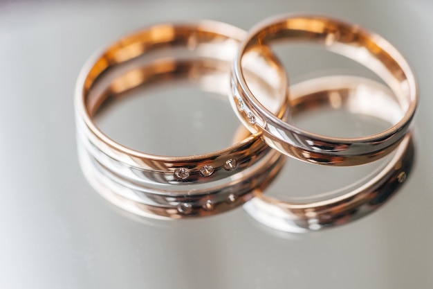 Wedding rings on the mirror surface