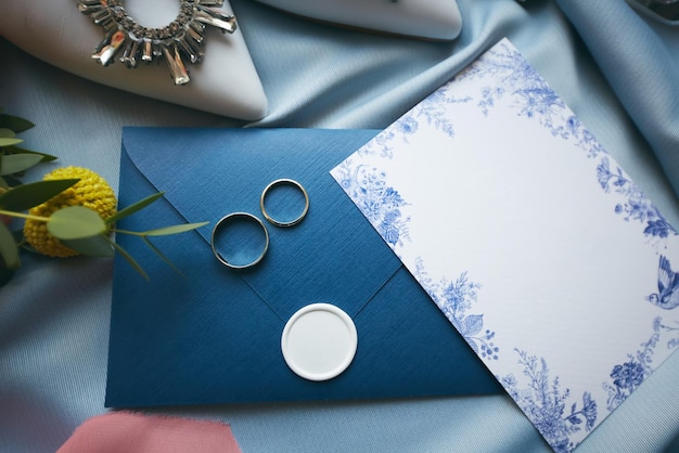 Wedding rings and wedding invitation Shallow dof