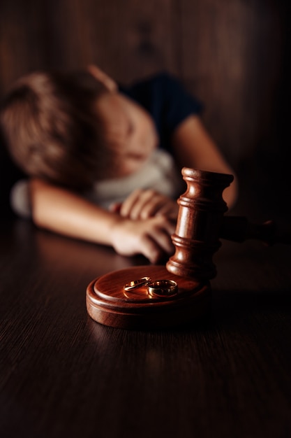 Wedding rings and wooden gavel