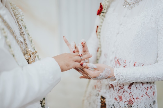 wedding romantic couple wear a wedding rings