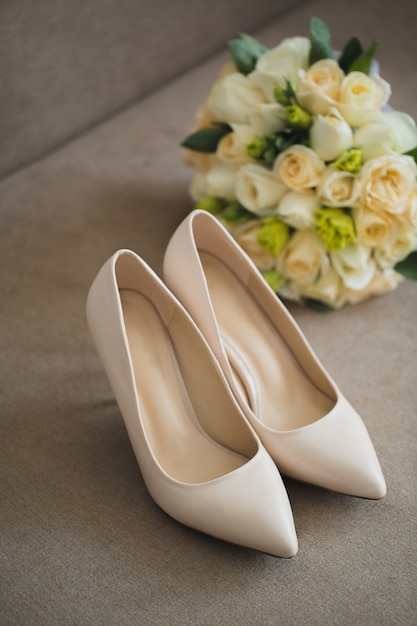 Wedding shoes and bouquet