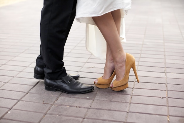 Wedding shoes of the groom and the bride