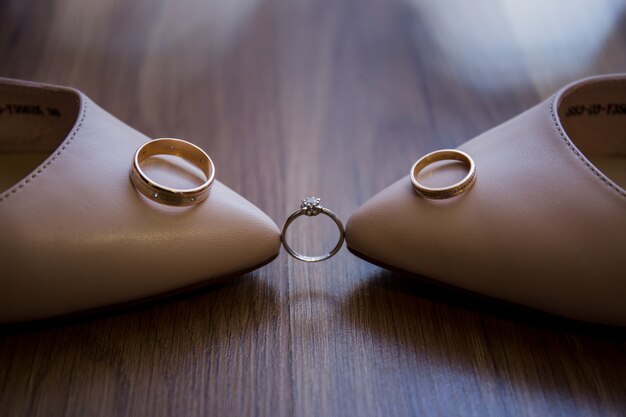 A wedding shoes with wedding rings