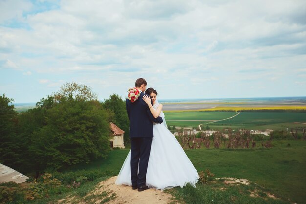 Wedding shot of bride and groom in park