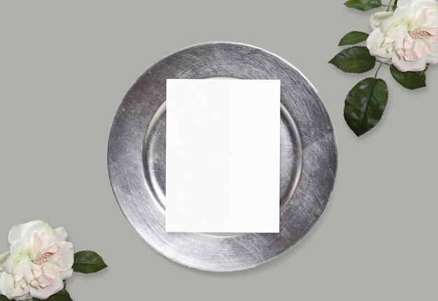 Wedding stationery mock-up scene. Blank greeting card, brillant grey plate